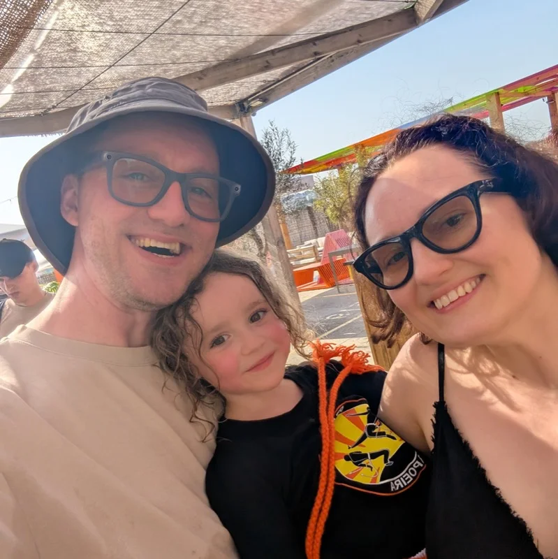 Anna, Eugene and Alexandra on Alexandra's Capoeira belt ceremony